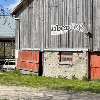 Uber dog farm barn building
